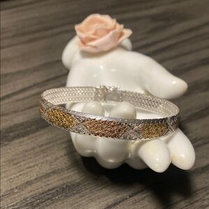 Intricate Silver and Gold Textured Bracelet